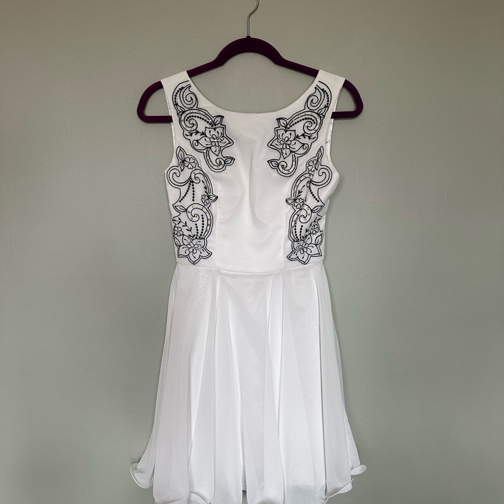 Elegant White Dress with Black Embroidery